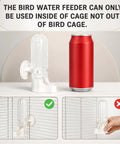 Hassle Free Automatic Bird Water Dispenser With Hanging Cage Mount For Parakeets Plus Small Flocks Featuring Leak Proof Self Refilling Trough And Zero Drama Leak Control In White Two Pack beside a soda can for size reference.
