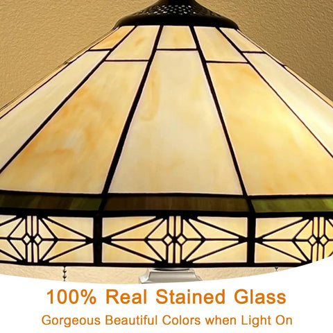 Close-up of Stained Glass Tiffany Style Table Lamp With 2 Lights, 16 Inch Wide Cream Color Shade focusing on geometric stained glass pattern