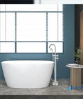 Floor Mount Bath Tub Faucet Freestanding Tub Filler With High Flow Shower And 360 Degree Swivel Spout Handheld Shower, chrome finish in bathroom setting.