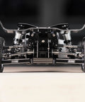 Front view of Losi Stainless Steel U Joint Drive Shaft And Axle Set for Micro B Micro T RC Cars showing suspension and wheels.