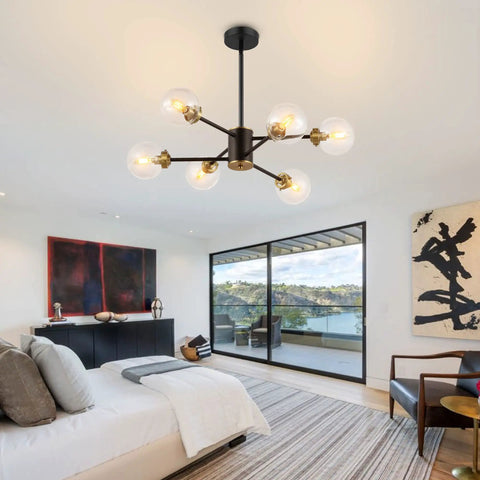 Six Light Sputnik Chandelier Pendant Light With 4.7 Inch Glass Globe Shades in modern bedroom with floor-to-ceiling window