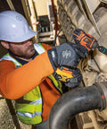 Worker using Impact Socket Set For One Half Inch Drive Metric 12 Point Deep Sockets Self Adjusting Between Sizes