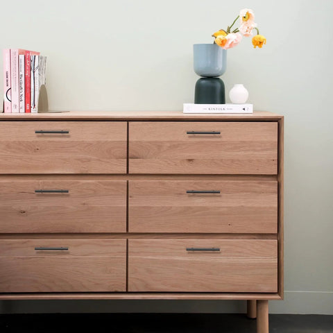 Dresser with 10 Pack Matte Black Cabinet Handles 4 Inch Center To Center, 6-3/8 Inch Overall Length, installed on drawers.