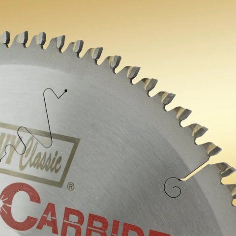 Close-up of 7 1/4 Inch Tungsten Carbide Circular Saw Blade With 60 Tooth Triple Chip Grind for smooth plastic cutting.