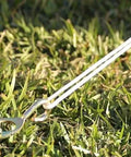 Heavy Duty Lag Bolts Kit With HexHook Pro Anchoring Plate 12 Pack installed in grass for GroundGrabba Pro stakes