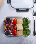 Top view of Ten Pack 22 Oz Glass Meal Prep Containers With Lids Durable Borosilicate Glass For Fresh Meal Prep filled with salad