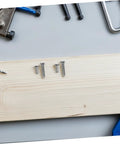 Hella Solid Mini Screw Kit For Eyeglass And Laptop Repair Packs durable self tapping screws on a wooden surface.