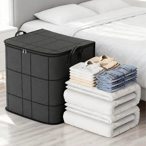 Oversized 160L Storage Bag Organizer Waterproof Non Woven With Double Zippers And Reinforced Handles For Moving Supplies Traveling Clothes And Blankets Gray next to folded clothes and blankets