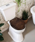 Generic Toilet Seat Replacement Round Slow Quiet Close Resin Wood Bathroom on a white toilet with a wooden finish.