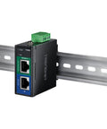 Heavy Duty 95 Watt Gigabit PoE Plus Plus Injector Rock Solid Power Over Ethernet Adapter For Industrial Jobs Straight Up Government Approved Gear With Four Pin Terminal Block And Crisp Led Indicators mounted on metal rail.