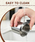Hand rinsing Stainless Steel 51mm Coffee Dosing Cup For Espresso Machines under running water