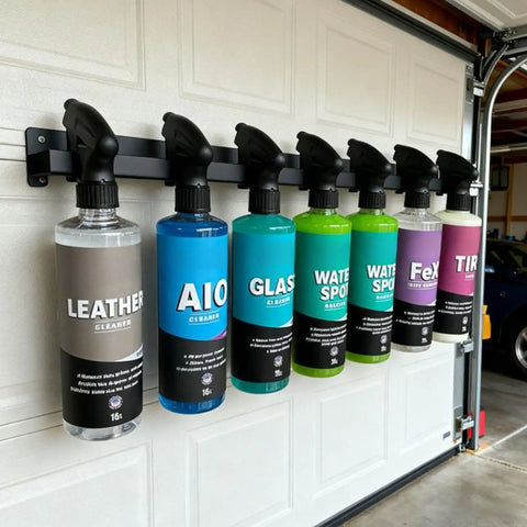 Rock Solid Wall Mounted Trigger Bottle Holder Rack For Garage Workspace And Mobile Detailing Cart With Heavy Gauge Coated Steel Frame holds six spray bottles.