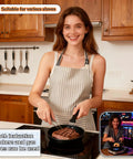Woman cooking with 4.7 Inch Mini Frying Pan Nonstick For One Egg Breakfast with hanging hole on gas stove in kitchen