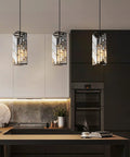 Fresh Black Metal Crystal Pendant Lights With Smooth Adjustable Chain For Kitchen Island Dining Room And Bedroom Killer Modern Industrial Lighting Fixtures 3 Pack in stylish kitchen setting.
