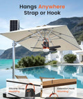 20 Inch Portable Ceiling Fan With Solar Charging And 20000 Mah Battery Includes Wireless Remote mounted on a patio umbrella.