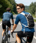 Cyclists wearing lightweight hydration pack for running and cycling, adjustable reflective vest for men and women