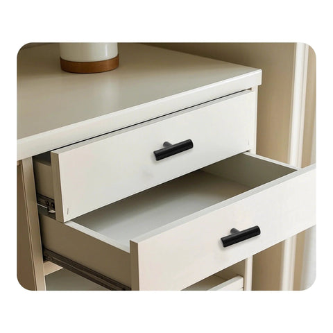 Six Pack 2 Inch T Bar Cabinet Knobs In Brushed Nickel Finish on white dresser drawer