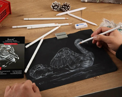 Hands sketching with white charcoal pencil from White Charcoal Pencils Set 12 Piece For Dark Paper Drawing And Sketching