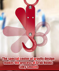 Gravity Powered Automatic Safety Hook for 2200 Lb Lifting with motion illustration showing center of gravity design