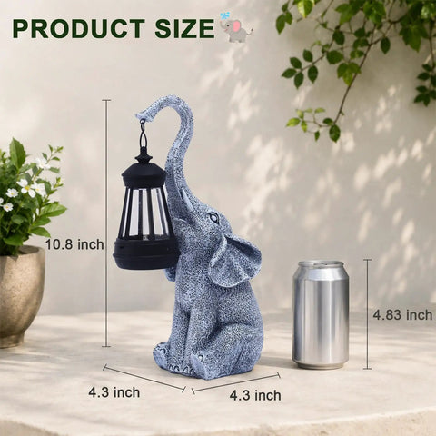 Elephant Statue Garden Decor With East Asian Charm, Cute Outdoor Home Figurine with Solar Lantern, next to a soda can for scale.