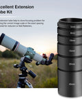 Astronomy T2 Extension Tube Kit with spacers 5mm to 40mm next to a telescope, all-metal anodized aluminum, M42x0.75 threads