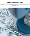 Close-up of 10mm Steel Eyelet Punch Tool and base kit with 100 silver eyelets for DIY leathercraft, showing grommet installation detail.