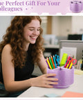 Woman holding 360 Degree Spin Glitter Pencil Holder In Purple PU Leather Four Compartment Desk Organizer Cup with stationery