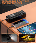 Portable Tire Inflator Air Compressor With Digital Pressure Gauge, 180 PSI on desk charging phone, emergency light shown