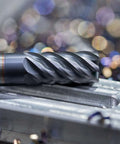 Close-up of 2.5mm end mill with 6mm straight shank and four spiral flutes, HSS-AL cutter