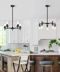 Six Light Brushed Nickel Chandelier With Clear Glass Shades for kitchen island and dining room in modern farmhouse style