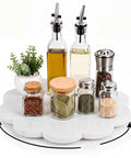 10 Inch Scalloped Marble Lazy Susan Hella Smooth Spinning Kitchen Turntable For Spices Oils And Condiments with jars and bottles.