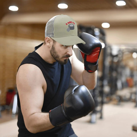 Man boxing in gym wearing Apricot Baseball Cap For Men Camp Hat Sun Shield With Printed Design, Cool Golf Style Baseball Hat