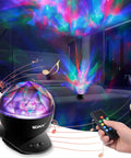 Aurora Borealis Light Projector With Remote, 8 Lighting Modes, Built In Speaker And Timer projecting colorful lights on ceiling