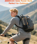 Cyclist with backpack featuring Solar Charger Power Bank 40000mAh With PD 20W Fast Charging Built In 4 Cables Dual Bright Flashlights