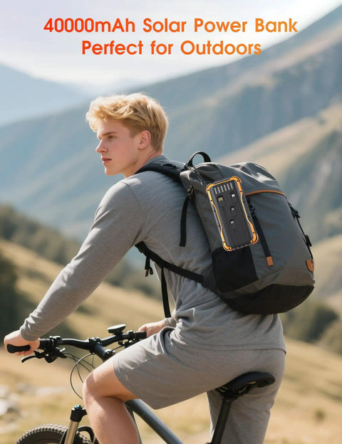 Cyclist with backpack featuring Solar Charger Power Bank 40000mAh With PD 20W Fast Charging Built In 4 Cables Dual Bright Flashlights