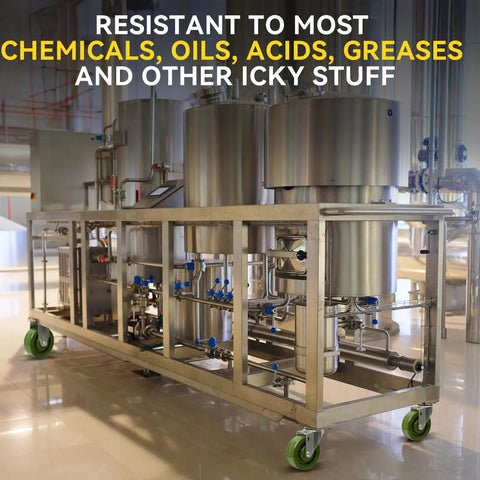 Industrial kitchen equipment on green caster wheels with message about chemical resistance