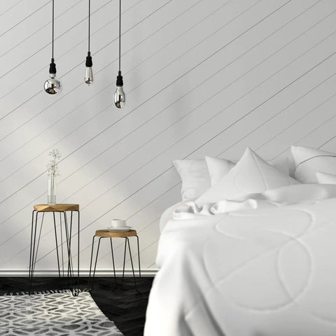 Modern bedroom with hanging lights above bed, featuring 100-Piece Plastic Cable Gland Kit For DIY Hanging Lights And Ceiling Installations.