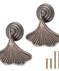 Close-up of Ginkgo Leaf Shape Knob Handles, 2 Pack Antique Nickel Zinc Alloy Drawer Pulls with screws for home renovation projects.