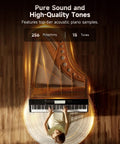 Top view of OURA S100 88 Key Graded Hammer Action Digital Piano With Bluetooth, woman playing with overlay of internal strings.