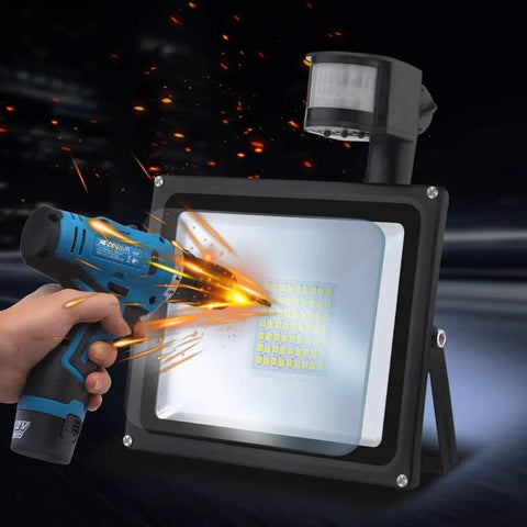 JUDYSSY Solar Flood Lights 20W Warm White Led Spotlight with Motion, showing installation with power drill.