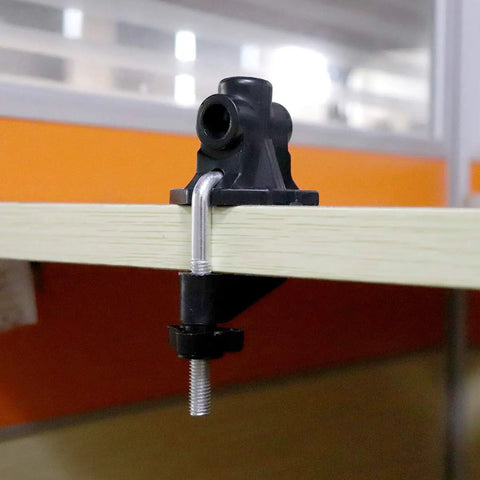 Universal Desk Clamp Mount Bracket for Mic Stands and Table Lamps attached to a desk edge, ideal for DIY setups.