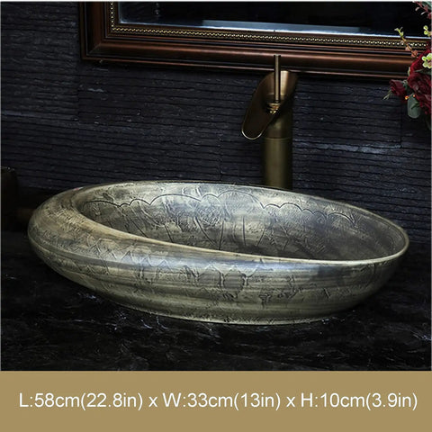 Vintage Handpainted Ceramic Vessel Sink For Bathroom Vanity Countertop Featuring Tough Glazed Finish And Super Slick Cleanup In Rad Ink Green No Overflow Basin, oval shape, mounted on dark countertop, modern faucet.