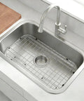 Heavy Duty Foldable Sink Protector Grid With Center Drain And Rounded Corners No Fuss Stainless Steel Drop In Sink Bottom Rack in kitchen sink.