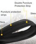 Close-up of 700x25c road bike tire with inner tube and tire levers, showing double puncture protection strip and Kevlar construction.