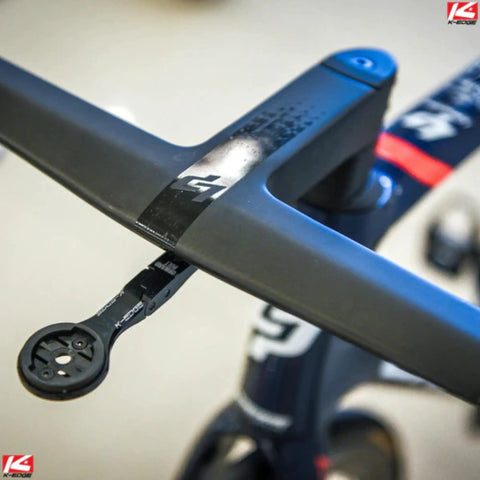 Integrated Handlebar System Bicycle Computer Mount For Garmin And Wahoo GPS Devices in black, close-up view of secure mount.