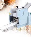 Heavy Duty Electric Dumpling Wrapper Press Maker 140W Motor cranks out 60 skins per minute, showcasing non-stick hopper and dough output.