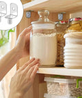 Fifty Piece Bad Boy Metal Shelf Support Pegs And Slick L Shaped Cabinet Clips With Silicone Sleeve For Straight Forward Wood Shelving And Kitchen Furniture Build in action on a pantry shelf.