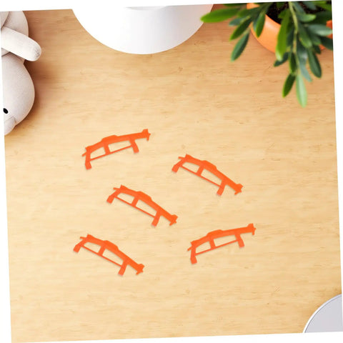 5 Piece Glider Plane Bracket Kit With Rubber Band Power For Do It Yourself Aircraft Builds on wooden table