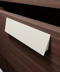 No Sweat Peel And Stick Finger Pull Handles For Cabinets on a wooden drawer, white adhesive handle, 1 x 4 3/4 x 3/8 x 1 3/8 inch.