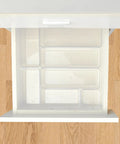 Clear stackable drawer organizer set for cosmetics in a drawer, part of Clean Up Your Counters With This Super Solid 15 Piece Clear Plastic Drawer Organizer Set.